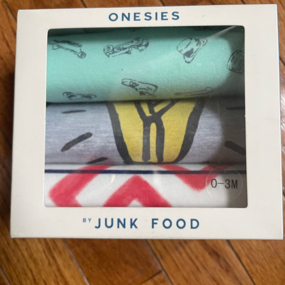 Junk Food Clothing Mint, Gray, and Red Bodysuits